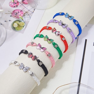 Handmade woven butterfly charm bracelets for couples in multiple colors with adjustable cords