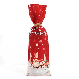 Christmas wine bottle cover with red festive Santa print for holiday table decor