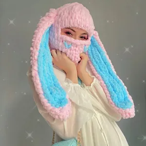 Pink and blue knitted bunny ear balaclava hat with soft chenille texture and star detail