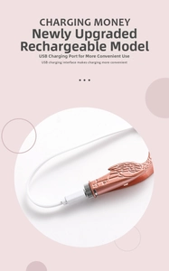 Detail of rose gold illuminated earwax remover with silicone tip and USB charging port