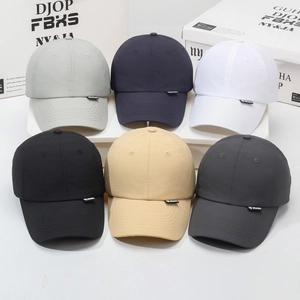 Breathable outdoor sports baseball caps shown in six colors on white display stands