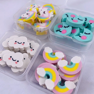 Close-up of cute cartoon unicorn, rainbow and cloud erasers in transparent storage boxes