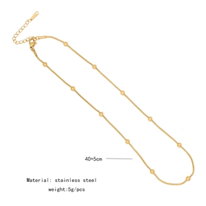 Detailed view of golden stainless steel snake chain necklace with small beads, 40+5cm length