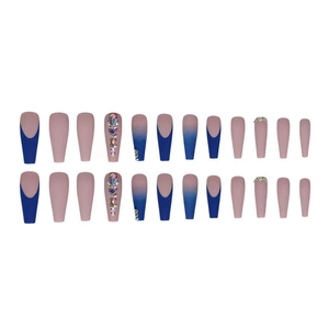 Macro view of long nude and blue gradient press-on nails with French rhinestones and sequins