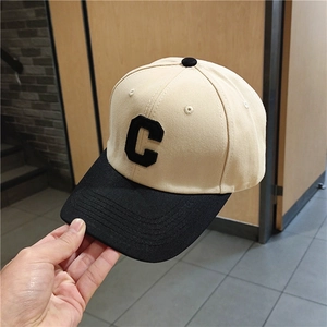 Unisex high-crown baseball cap with contrast brim and large embroidered C letter