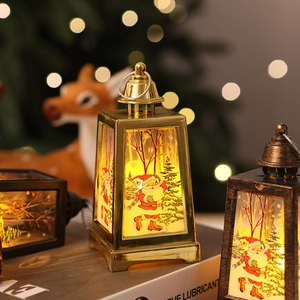 Detail of warm LED light shining through festive Christmas lantern with metal handle