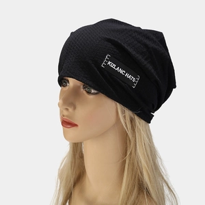Unisex black knit beanie with side logo patch for street style and outdoor sports