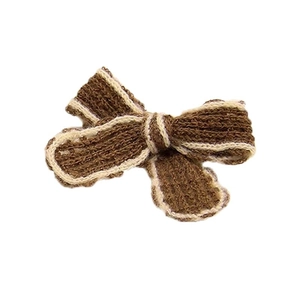 Brown knitted bow with beige edge trim for DIY clothing and autumn sweater decor