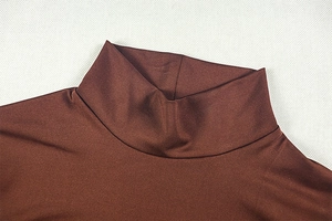 Detail of high neck stitching and knit fabric texture on this brown bodycon dress