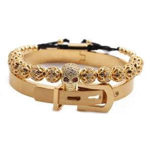 Gold skull beaded bracelet and buckle bangle set with red and white zirconia stones