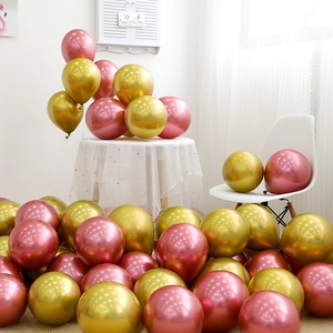 Detail of metallic pink and gold latex balloons with glossy finish for party decor