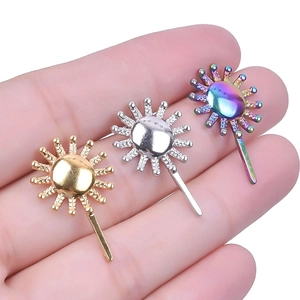 Detailed view of sun-shaped 304 stainless steel earrings in gold, silver and rainbow colors