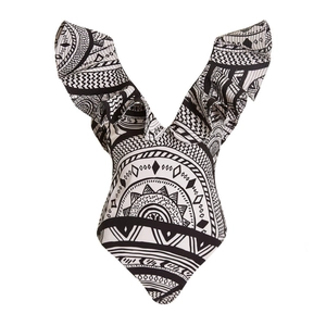 Deep V-neck one-piece swimsuit with black and white tribal print and ruffle shoulder details