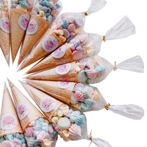 Cone-shaped transparent food bags for candy with colorful macaron marshmallow fillings