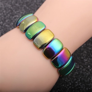 Close-up of a men's elastic bracelet with rectangular iridescent metallic electroplated beads