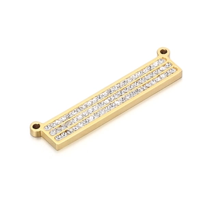 Close-up of geometric rectangular gold pendant with three rows of sparkling zircons