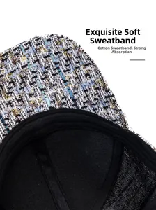 Macro detail of plaid tweed baseball cap featuring cotton sweatband and neat stitching
