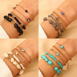 Set de pulseras bohemias multicapa Evil Eye con cadena dorada y piedras de colores