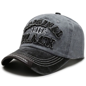 Vintage washed canvas baseball cap in dark grey with black brim and letter embroidery