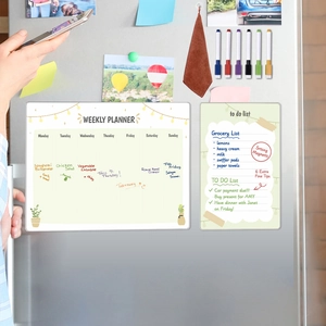 Magnetic weekly planner set on fridge with colorful markers and grocery list