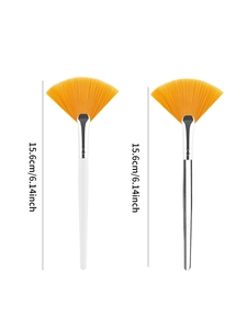 Detailed view of 15.6cm fan-shaped cosmetic brushes with orange bristles and length info