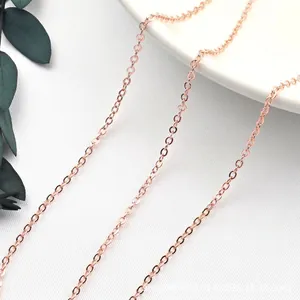 Macro detail of high-polish rose gold S925 sterling silver O-chain necklace links