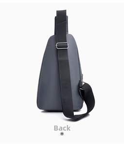 Rear view of grey waterproof oxford chest bag with adjustable black strap and metal buckle