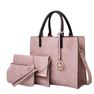 Pink 3-piece PU leather handbag set including tote, crossbody bag and small wristlet