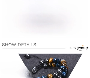 Detail of double-layer woven blue tiger eye stone bracelet with silver OM bead and magnetic stones