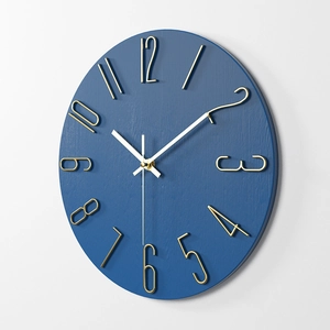Modern 12-inch blue wood grain wall clock with elegant gold metal hands and markers