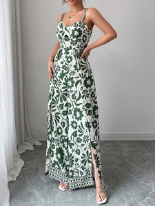 Detailed view of green floral wide-leg jumpsuit with side slits and airy fabric