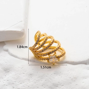 Detail shot of a gold multi-layer zircon ring with a star charm showing dimensions