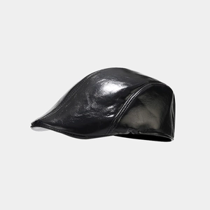 Detail of premium black PU leather texture and neat stitching on the beret cap