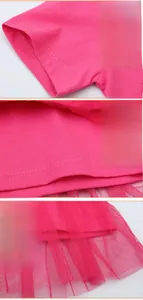 Detail of pink cotton knit dress showing sleeve cuffs and tiered red mesh skirt layers