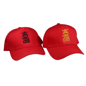 Pair of red baseball caps featuring 2025 Year of the Snake cartoon character embroidery