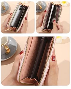 Detailed interior of pink zipper wallet with multiple card slots and phone compartment