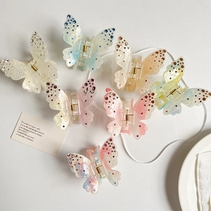 Chic gradient butterfly hair clips with acrylic crystals and transparent finish