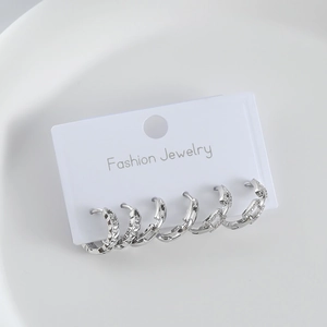 Juego de pendientes de plata S925 con seis aros plateados y detalles de cristal fino