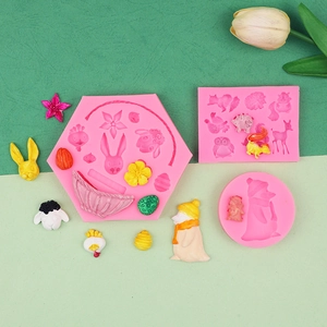 Flache Ansicht von rosa Silikonformen für Ostertiere mit Kaninchen, Schaf und Küken