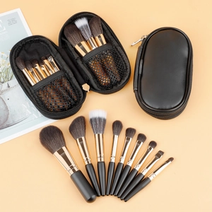 Mini 9-piece makeup brush set with synthetic bristles and two black portable zipper cases