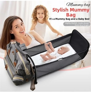 Detail view of the multi-functional mummy bag expanded into a portable baby crib with mesh