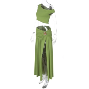 Detail of avocado green two-piece set featuring a side slit skirt and one-shoulder top