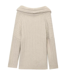 Detailed view of the rib-knit texture on a cream off-shoulder long sleeve sweater