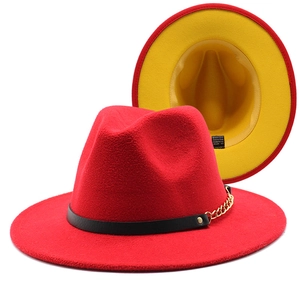 Two-tone wool fedora with red exterior, yellow lining and gold chain band detail