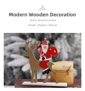 Close-up of Nordic wooden Santa and reindeer tabletop ornament in a festive setting