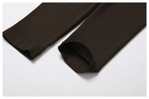 Close-up of dark brown seamless yoga pants with high-elastic ribbed cuffs and fine stitching
