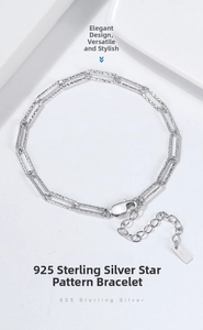 Macro detail of S925 sterling silver paperclip bracelet with textured star pattern