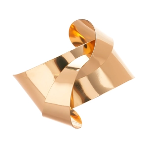 Sculptural gold geometric knot open cuff bracelet with a polished metallic finish