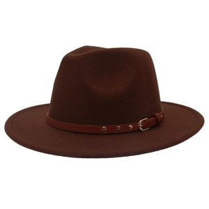 Detail of dark brown wool fedora with a thin brown belt strap and golden buckle buckle