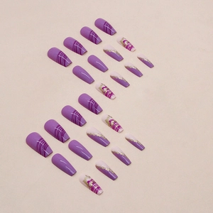 Long trapezoid press-on nails in purple with gold foil lines and marble design